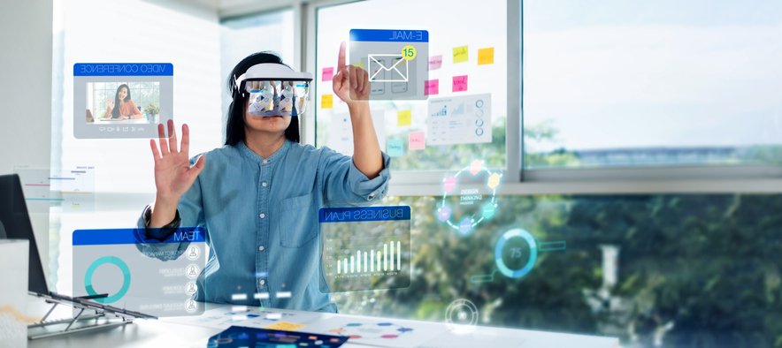 asian woman using augmented reality (ar) and Mixed reality glasses simulation meeting and working with hologram over table at office.virtual reality development process concept